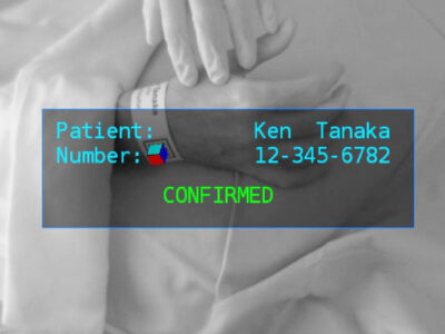 Nurse obtaining instant and hands-free patient identification before drug administration.